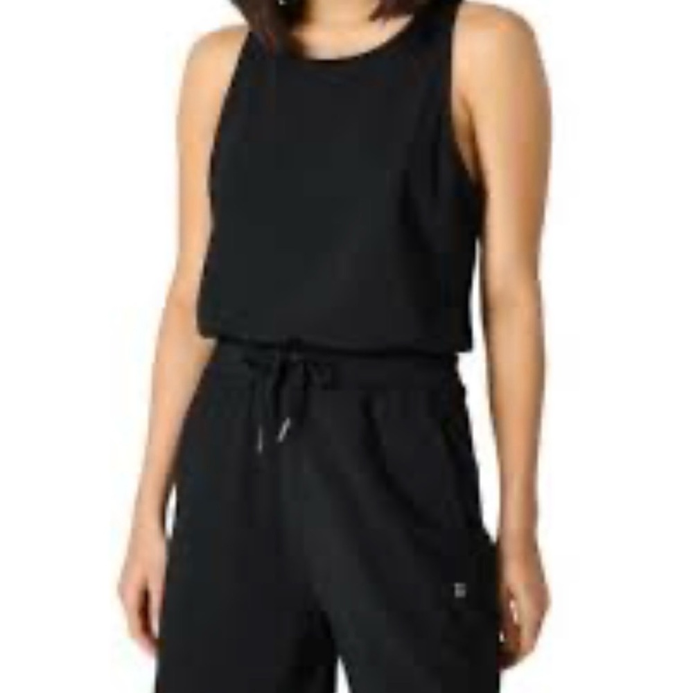 Sz 12 (L)Sweaty Betty Black Explorer Romper. Worn Once. PTP 19”